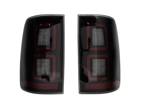 Raxiom Tail Lights Dodge Ram 1500 (09-18) [w  Factory Halogen Lights] Black Housing   Smoked Lens For Sale